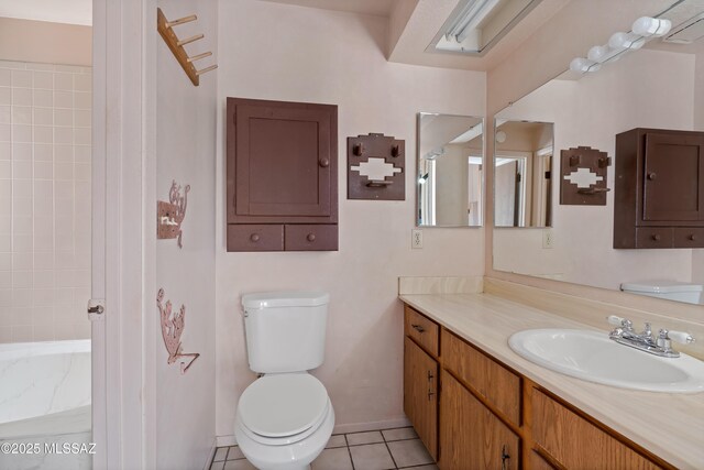 2991 W Basil Pl, Tucson, AZ 85741 - clothes washing area with water heater, light floors, washing machine and clothes dryer, and a textured ceiling