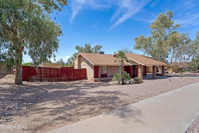 2991 W Basil Pl, Tucson, AZ 85741 - ranch-style home with fence, covered porch, and a shingled roof