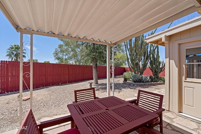2991 W Basil Pl, Tucson, AZ 85741 - view of patio / terrace with outdoor dining space and a fenced backyard