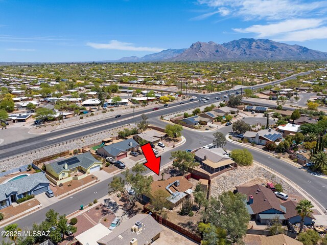 2991 W Basil Pl, Tucson, AZ 85741 - aerial overview of property's location with a mountain backdrop and nearby suburban area