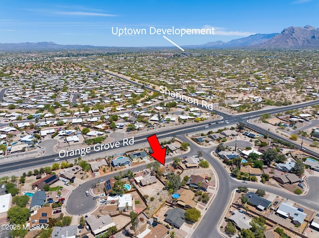 2991 W Basil Pl, Tucson, AZ 85741 - aerial overview of property's location with a mountain backdrop and nearby suburban area
