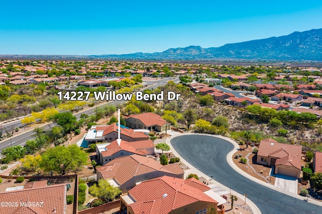 bird's eye view with a mountain view and a residential view