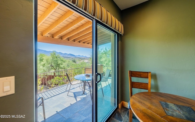 balcony featuring a mountain view