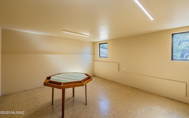 basement featuring a wealth of natural light