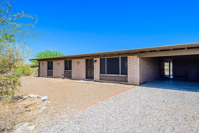 10575 E Placita Diego, Tucson, AZ 85748 - ranch-style house with brick siding and a carport