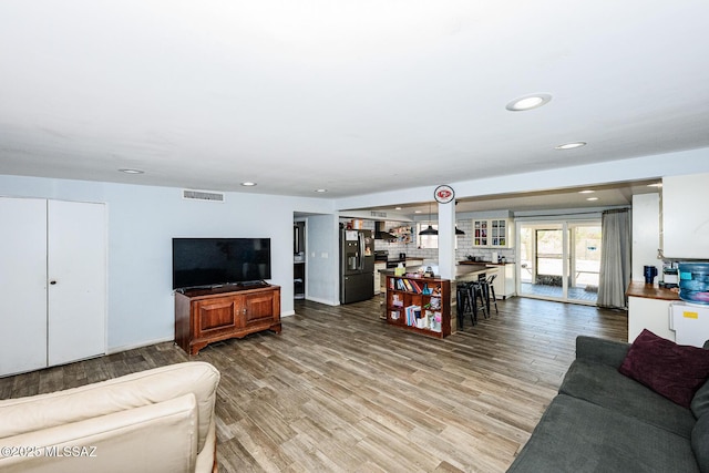 10575 E Placita Diego, Tucson, AZ 85748 - living area featuring wood finished floors and recessed lighting