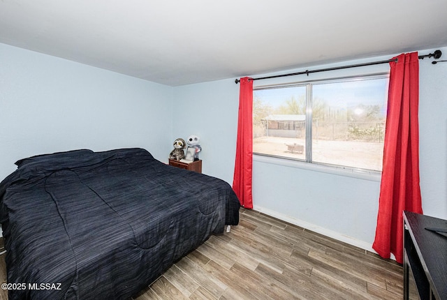 10575 E Placita Diego, Tucson, AZ 85748 - bedroom with wood finished floors and baseboards