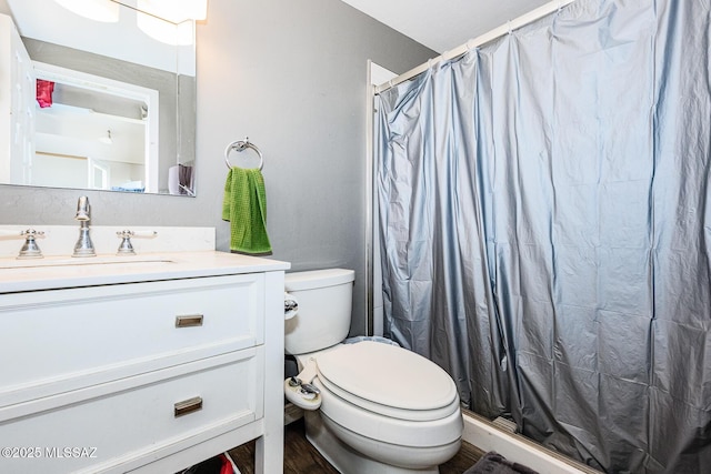 10575 E Placita Diego, Tucson, AZ 85748 - full bath featuring toilet, vanity, a shower with curtain, and wood finished floors