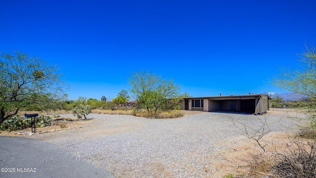 10575 E Placita Diego, Tucson, AZ 85748 - view of yard featuring driveway and a carport