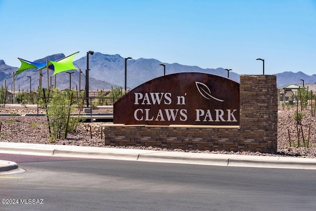 community sign featuring a mountain view