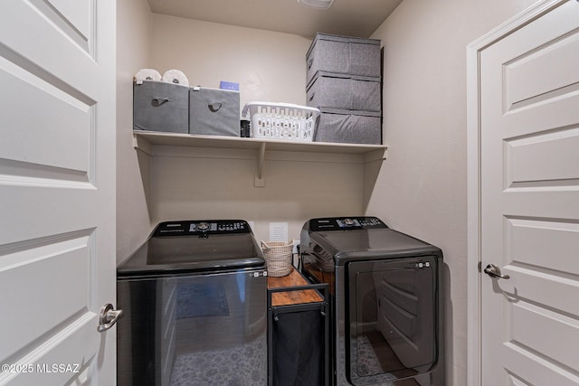 washroom with washer and dryer and laundry area