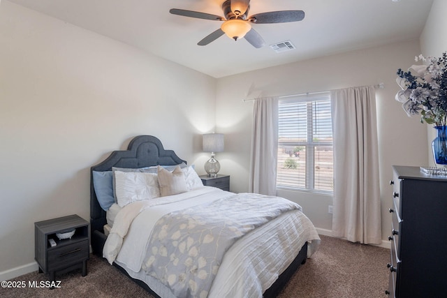 bedroom with visible vents, carpet floors, and baseboards