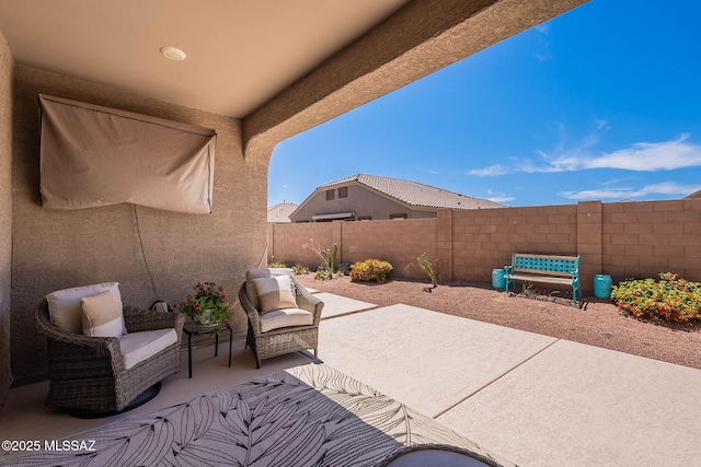 view of patio / terrace featuring a fenced backyard