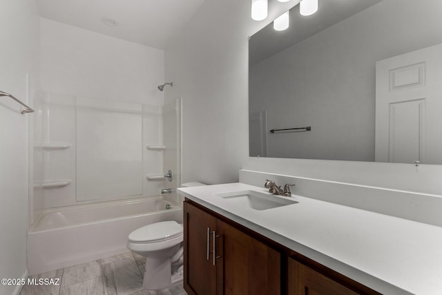 9010 W Bruce St, Tucson, AZ 85735 - full bathroom with toilet, marble finish floor, vanity, and shower / bathing tub combination