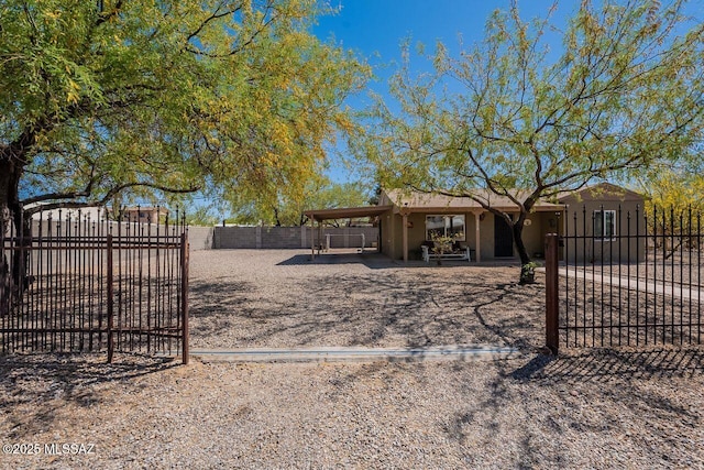view of yard featuring a gate and fence private yard