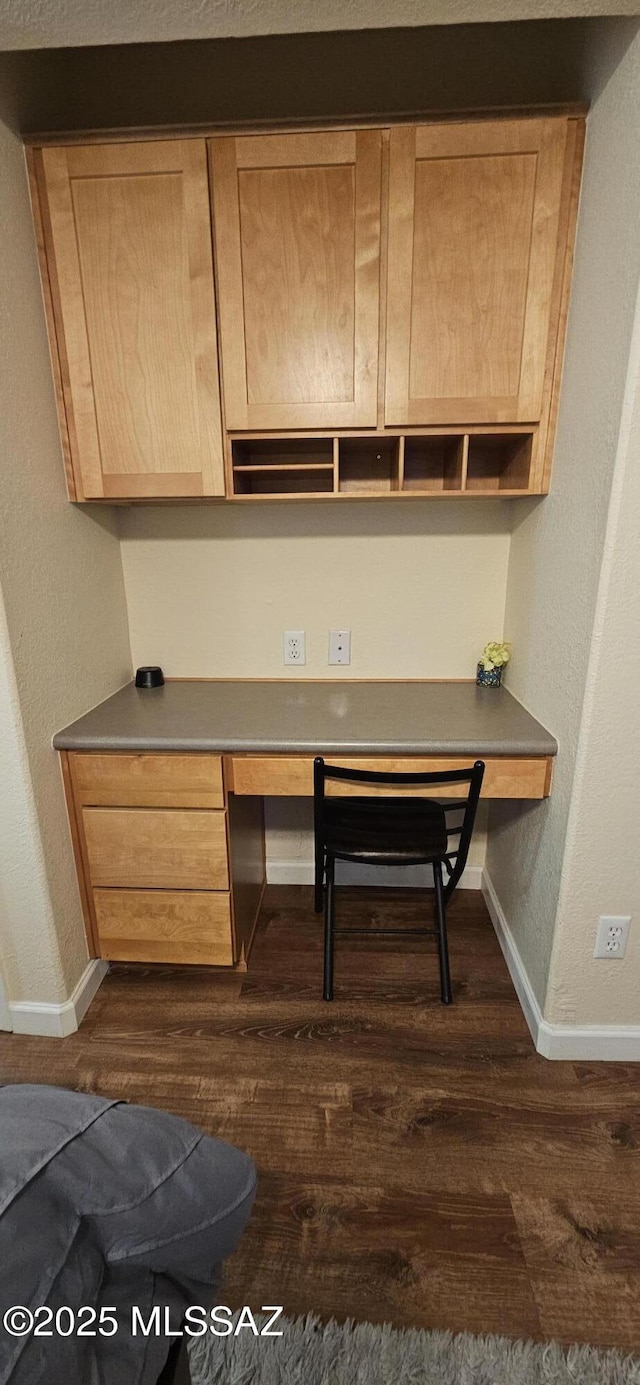 6651 N Campbell Ave Apt 152, Tucson, AZ 85718 - unfurnished office with built in study area, dark wood-style floors, and baseboards