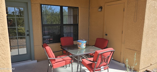 6651 N Campbell Ave Apt 152, Tucson, AZ 85718 - view of patio featuring outdoor dining area