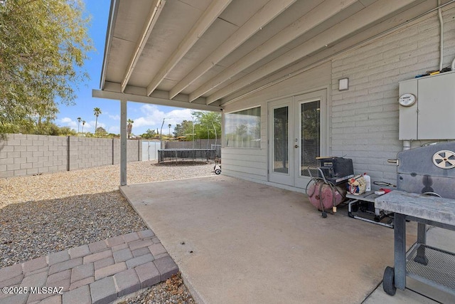 view of patio with a fenced backyard and french doors
