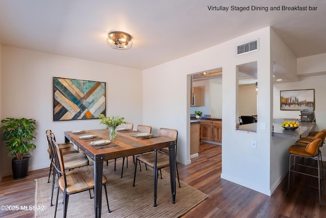 912 S Las Lomas Cir, Green Valley, AZ 85614 - dining room with baseboards, visible vents, ceiling fan, and dark wood-style flooring