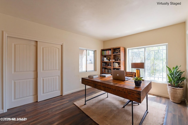 912 S Las Lomas Cir, Green Valley, AZ 85614 - home office with dark wood-style flooring, baseboards, and plenty of natural light