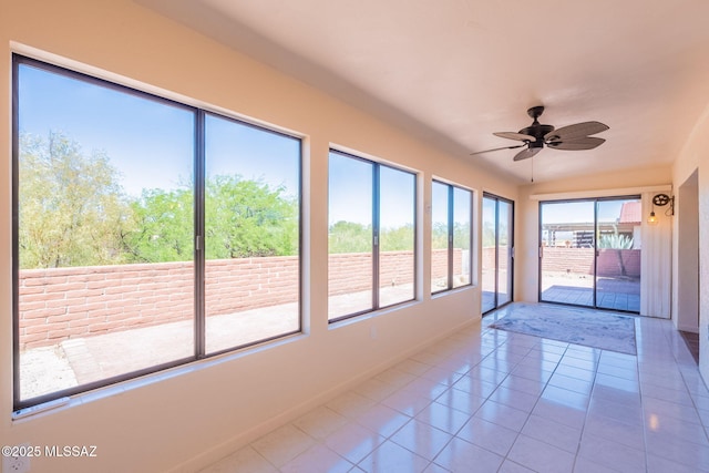 912 S Las Lomas Cir, Green Valley, AZ 85614 - unfurnished sunroom featuring tile patterned flooring and baseboards