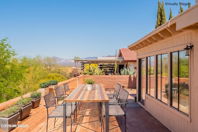 912 S Las Lomas Cir, Green Valley, AZ 85614 - deck featuring a mountain view and outdoor dining area