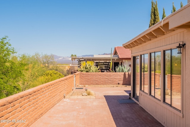912 S Las Lomas Cir, Green Valley, AZ 85614 - view of patio with a mountain view and a pergola