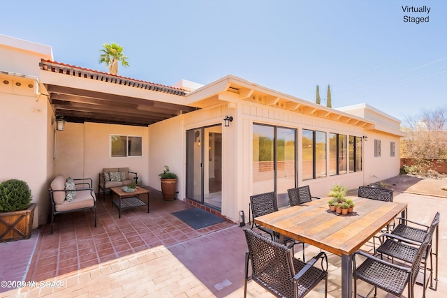 912 S Las Lomas Cir, Green Valley, AZ 85614 - view of patio featuring outdoor lounge area