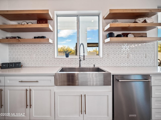 2540 W Oasis Springs Ct, Tucson, AZ 85742 - kitchen featuring open shelves, a sink, dishwasher, and decorative backsplash