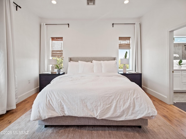 2540 W Oasis Springs Ct, Tucson, AZ 85742 - bedroom with baseboards, multiple windows, recessed lighting, and visible vents