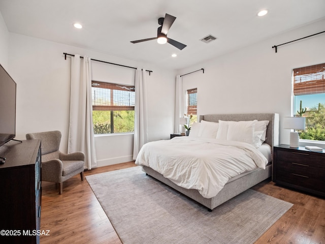 2540 W Oasis Springs Ct, Tucson, AZ 85742 - bedroom with visible vents, recessed lighting, and wood finished floors