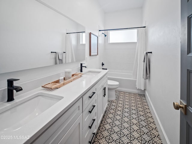 2540 W Oasis Springs Ct, Tucson, AZ 85742 - bathroom with a sink, toilet, double vanity, and shower / tub combo