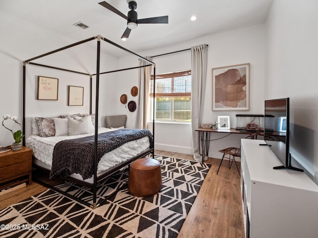 2540 W Oasis Springs Ct, Tucson, AZ 85742 - bedroom featuring a ceiling fan, recessed lighting, wood finished floors, and visible vents
