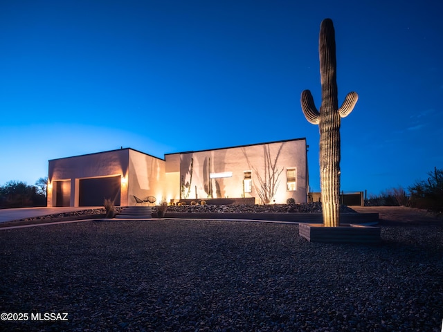 2540 W Oasis Springs Ct, Tucson, AZ 85742 - view of front facade with a garage, stucco siding, and concrete driveway