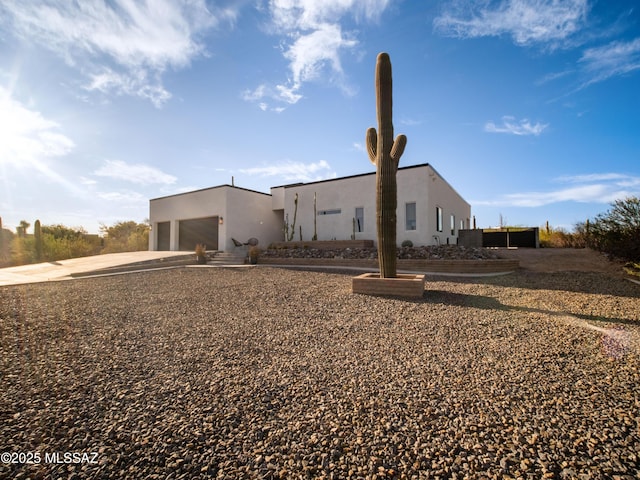 2540 W Oasis Springs Ct, Tucson, AZ 85742 - view of front of house featuring a garage and stucco siding