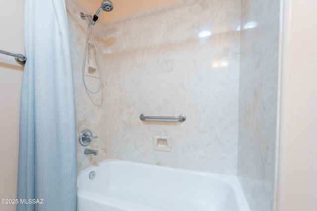 bathroom with shower / tub combo with curtain