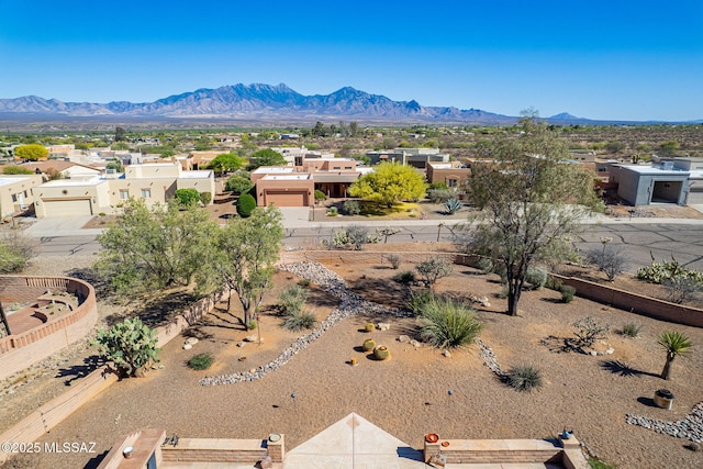 aerial view featuring a mountain view and a residential view