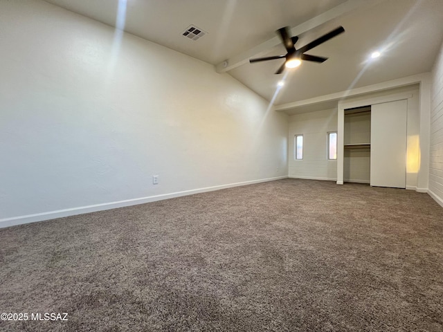 interior space with vaulted ceiling with beams, a ceiling fan, visible vents, carpet, and baseboards