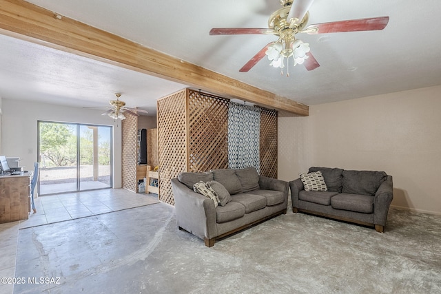 living room with beam ceiling, a ceiling fan, and concrete flooring