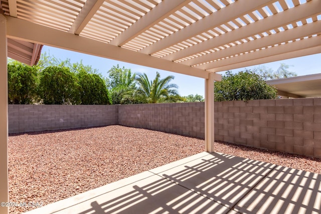 view of patio with a fenced backyard and a pergola