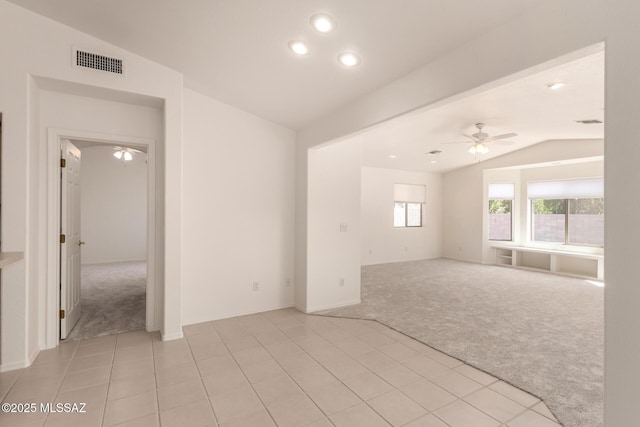 unfurnished room featuring recessed lighting, ceiling fan, visible vents, vaulted ceiling, and light colored carpet