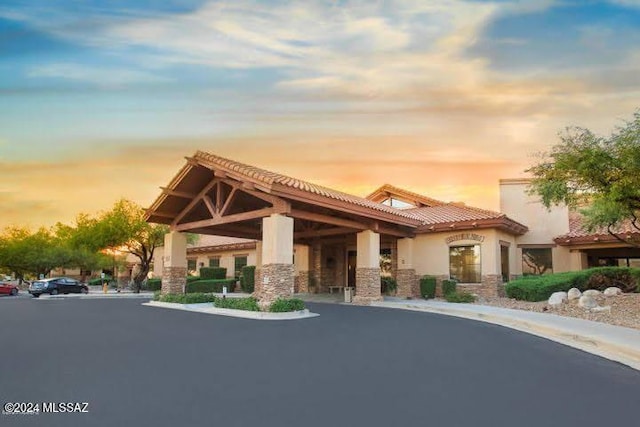 view of property at dusk