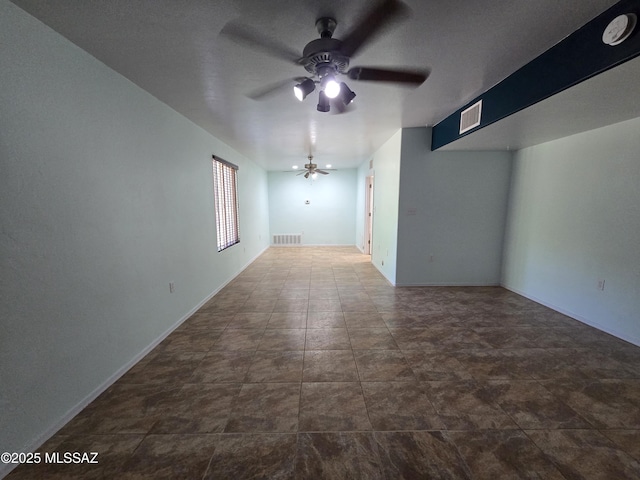 2045 S Lee St, Saint David, AZ 85630 - empty room featuring a ceiling fan, a smoke detector, and baseboards