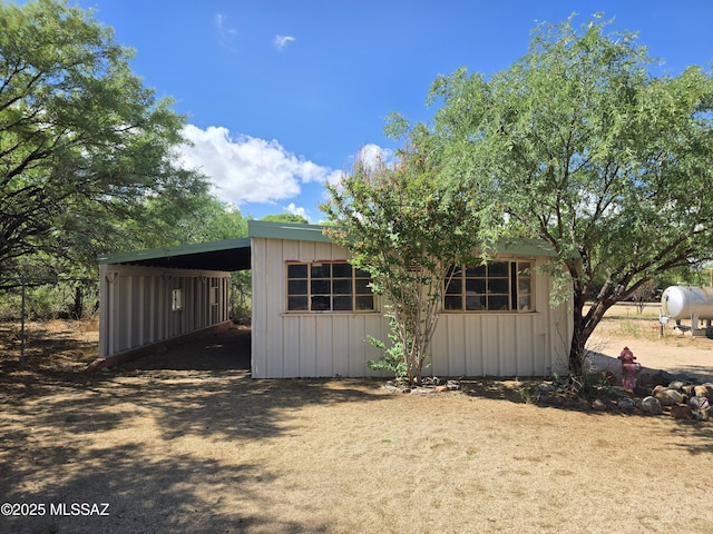 2045 S Lee St, Saint David, AZ 85630 - view of home's exterior featuring an attached carport and an outdoor structure