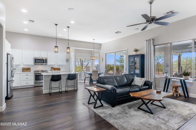 32968 S Cattle Trl, Oracle, AZ 85623 - living area featuring recessed lighting, a ceiling fan, dark wood-style floors, and visible vents