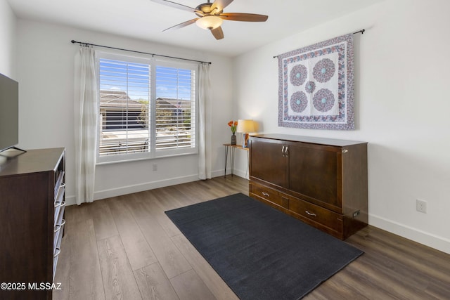 32968 S Cattle Trl, Oracle, AZ 85623 - interior space with a ceiling fan, baseboards, and wood finished floors
