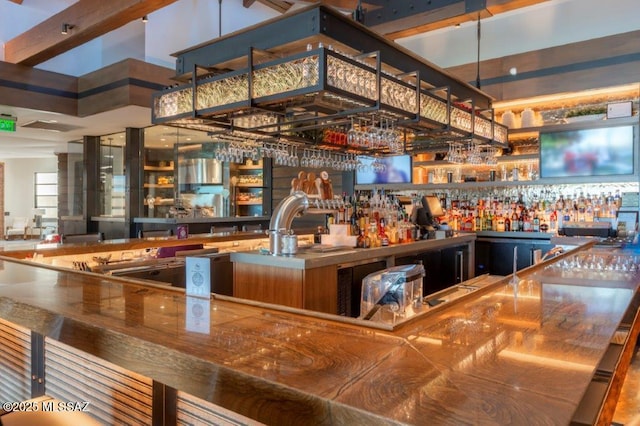 32968 S Cattle Trl, Oracle, AZ 85623 - bar featuring indoor wet bar and a towering ceiling
