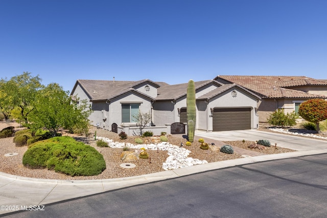 32968 S Cattle Trl, Oracle, AZ 85623 - single story home with a garage, stucco siding, driveway, and a tiled roof