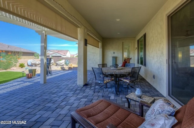 view of patio / terrace with an outdoor hangout area, outdoor dining area, and area for grilling