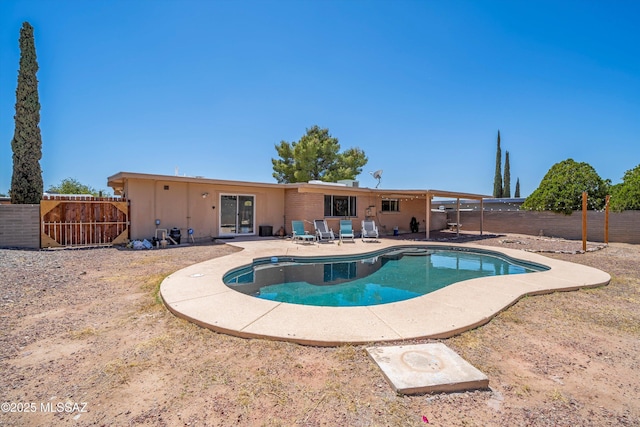 9061 E 39th St, Tucson, AZ 85730 - view of swimming pool featuring a fenced backyard, a fenced in pool, and a patio area